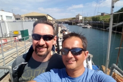 SImon & Naz take a moment for a selfie in between loading their dive gear.
